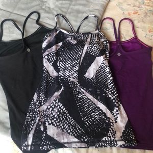 Set of three Lululemon Y tanks.